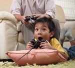 家庭用ゲームを楽しむ子どもイメージ