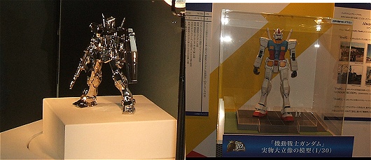 プラチナガンダム(左)とお台場にある実物大ガンダムの1/30モデル(右)。プラチナガンダムは田中貴金属ジュエリー製作。いわく「ガンダムの持つ魅力と輝きを永遠に保つことに成功しました」とのこと。