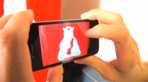 ↑ ピークシフト自販機と連動したAR用アプリの使用例(公式提供映像)。