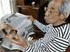 新聞と犬